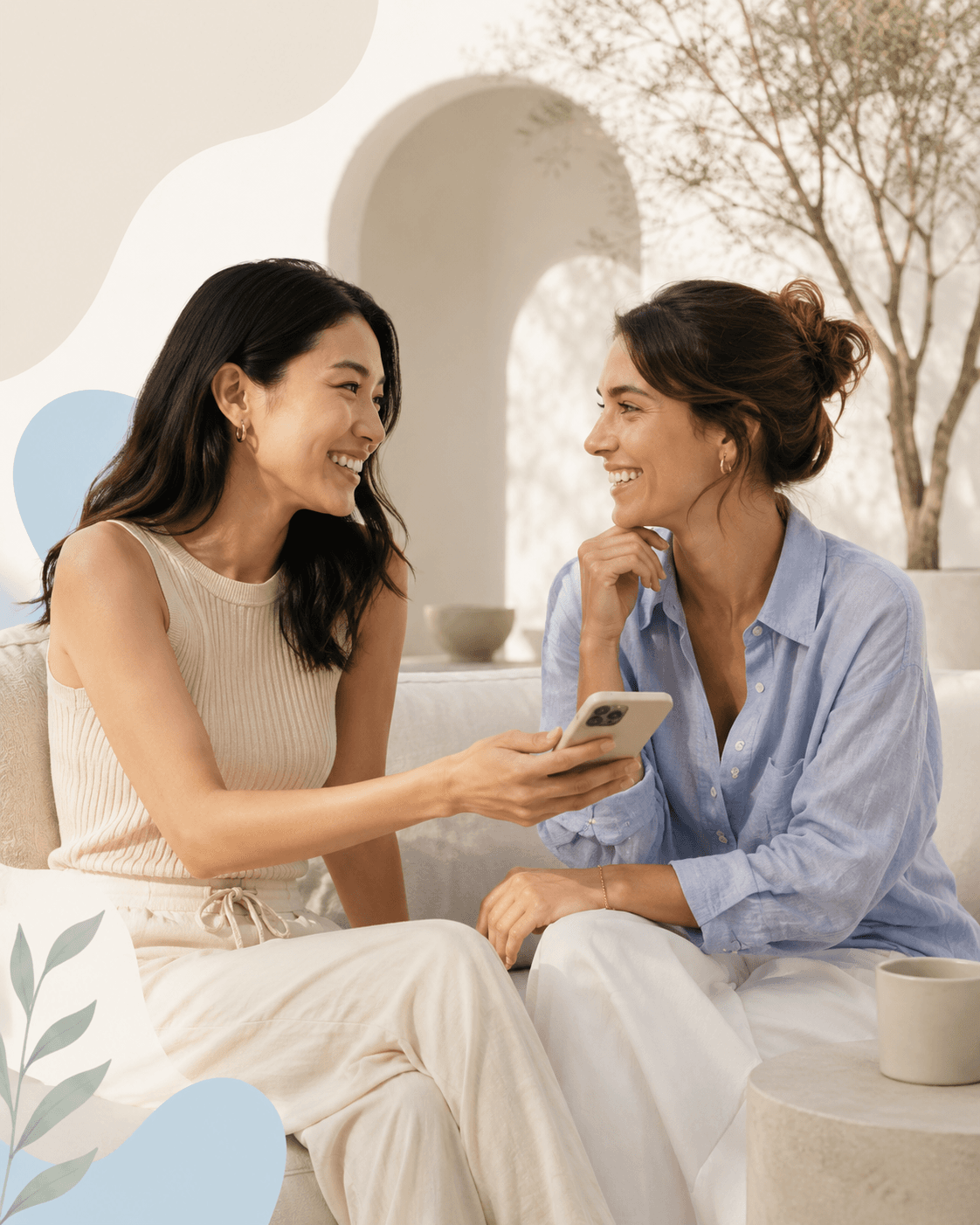 Woman seated comfortably holding a mug in a calm wellness setting
